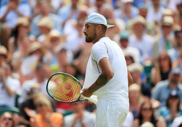 (220711) -- LONDON, July 11, 2022 -- Nick Kyrgios competes during the men s singles final match between Novak Djokovic of Serbia and Nick Kyrgios of Australia at Wimbledon Tennis Championship in London, Britain, on July 10, 2022. ) (SP)BRITAIN-LONDON-TENNIS-WIMBLEDON-MEN S SINGLES-FINAL LixYing 