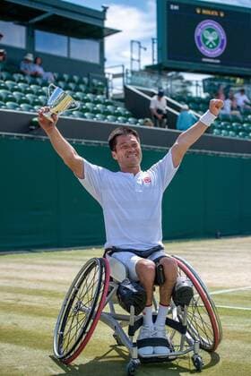 LONDON, ENGLAND - JULY 10: Shingo Kunieda of Japan holds the trophy after victory against Alfie Hewett of Great Britain during Gentlemen s wheelchair singles - Final during day fourteen of The Championships Wimbledon 2022 at All England Lawn Tennis and Croquet Club on July 10, 2022 in London, E Day Fourteen: The Championships - Wimbledon 2022 Copyright: xSebastianxFrejx