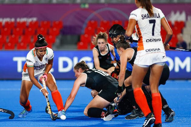 July 11, 2022, TERRASSA, BARCELONA, SPAIN: Players of India and Canada in action during the FIH Hockey Women s World Cup 2022, 9th - 16th, hockey match played between Canada and India at Estadi Olimpic on July 11, 2022, in Terrassa, Barcelona, Spain. TERRASSA SPAIN - ZUMAa181 20220711_zaa_a181_097 Copyright: xIrinaxR.xHx