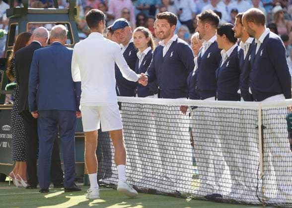 Linesman and champion Novak Djokovic with the trophy, trophy, award ceremony, presentation Copyright: xJuergenxHasenkopfx