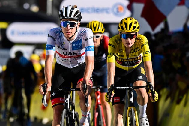 Slovenian Tadej Pogacar of UAE Team Emirates and Danish Jonas Vingegaard of Jumbo-Visma crosses the finish line of stage twelve of the Tour de France cycling race, a 166km race from Briancon to Alpe d Huez, France, on Thursday 14 July 2022. This year s Tour de France takes place from 01 to 24 July 2022. - UK OUT DAVIDxSTOCKMAN  x37482342x