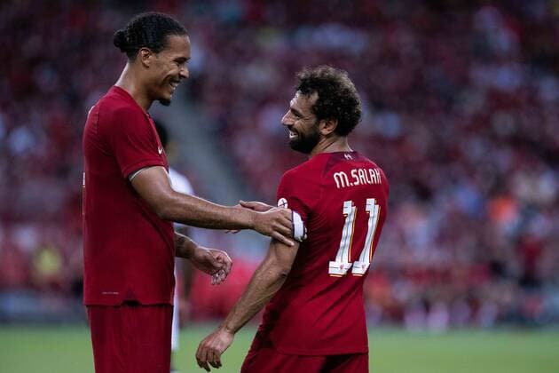 SINGAPORE, SINGAPORE - JULY 15: Virgil van Dijk and Mohamed Salah of Liverpool during the preseason friendly between Liverpool and Crystal Palace at National Stadium on July 15, 2022 in Sin Liverpool v Crystal Palace - Preseason Friendly Copyright: xSebastianxFrejx
