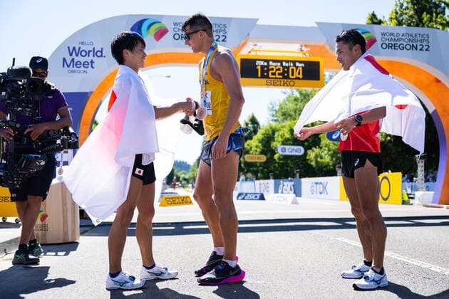 220715 Koki Ikeda of Japan second place , Perseus Karlström of Sweden third place and Toshikazu Yamanishi first place celebrate after competing in men s 20 km race walk during day 1 of the 2022 World Athletics Championships on July 15, 2022 in Eugene Photo Joel Marklund BILDBYRAN kod JM JM0323 bbeng friidrott athletics friidrett 2022 world athletics championships world athletics championships oregon22 friidrotts vm friidretts vm vm gang sverige jubel,  Copyright: JOELxMARKLUND BB220715JM090