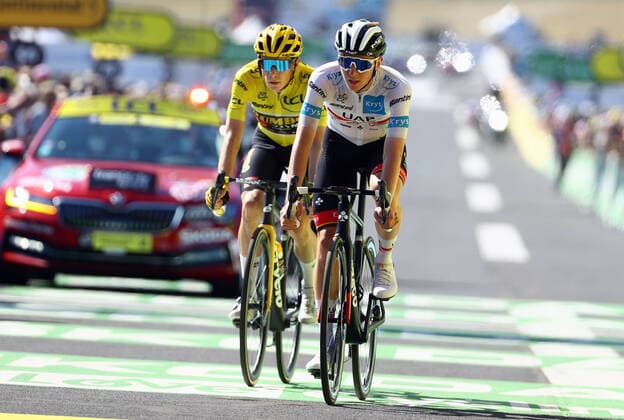 Slovenian Tadej Pogacar of UAE Team Emirates and Danish Jonas Vingegaard of Jumbo-Visma crosse the finish line at stage fourteen of the Tour de France cycling race, from Saint-Etienne to Mende (195 km), France, on Saturday 16 July 2022. This year s Tour de France takes place from 01 to 24 July 2022. - UK OUT DAVIDxPINTENS  x37537006x