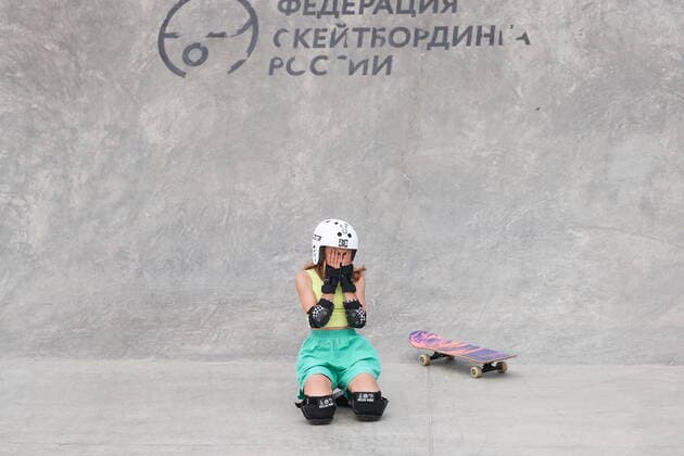 KAZAN, RUSSIA - JULY 17, 2022: A participant competes in a skateboarding event at the 2022 All-Russian Urban Games held in the Uram extreme park. The competition includes such events as 3x3 basketball, break dancing, skateboarding, air power athletics (workout), roller sports and BMX freestyle. This year, over 1,000 people from 37 regions of Russia are taking part in the Games. Yegor Aleyev TASS  TS13A9FA