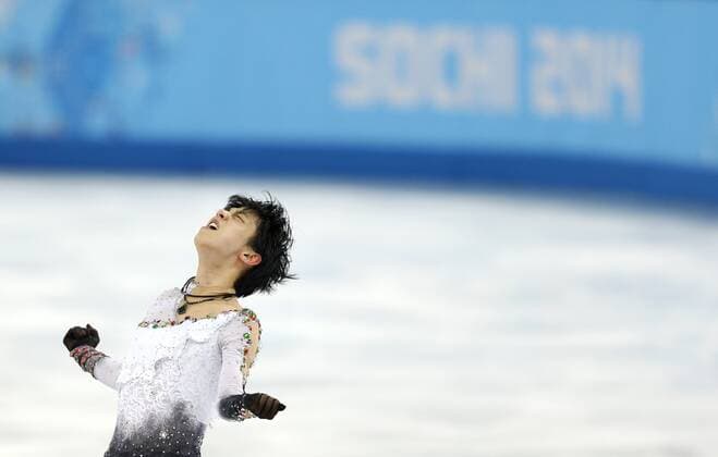 (220719) -- BEIJING, July 19, 2022 -- File photo taken on Feb. 14, 2014 shows Japan s Hanyu Yuzuru celebrating after the men s free skating of Figure skating, Eiskunstlauf event at the 2014 Sochi Winter Olympic Games, Olympische Spiele, Olympia, OS in Sochi, Russia. Japan s two-time Winter Olympic gold medalist Hanyu Yuzuru announced his decision to retire from competitive figure skating at a press conference, PK, Pressekonferenz in Tokyo, Japan on Tuesday. ) (SP)FILES-FIGURE SKATER-HANYU YUZURU WangxLili 