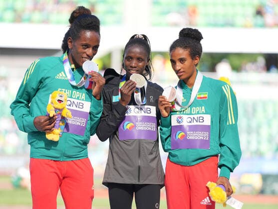 (220722) -- EUGENE, July 22, 2022 -- Gold medalist Kazakhstan s Norah Jeruto (C), silver medalist Ethiopia s Werkuha Getachew (L) and bronze medalist Ethiopia s Mekides Abebe attend the women s 3,000m steeplechase awarding ceremony at the World Athletics Championships Oregon22 in Eugene, Oregon, the United States, July 21, 2022. ) (SP)U.S.-EUGENE-ATHLETICS-WORLD CHAMPIONSHIPS-WOMEN S 3000M STEEPLECHASE-AWARDING CEREMONY WuxXiaoling 