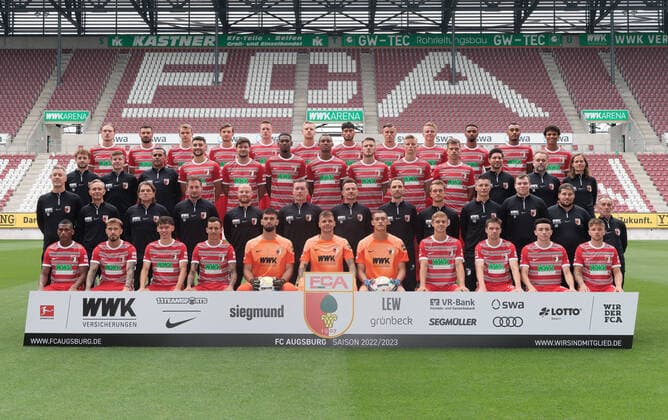FC Augsburg 1 BL, portrait date 2022 2023, team photo, hi row v li Fredrik Jensen, Daniel Caligiuri, Lasse Günther, Lukas Petkov, AndrÃ Hahn, Arne Maier, Ricardo Pepi, Ermedin Demirovic, Felix Götze, Noah Sarenren Bazee, Maurice Malone, Henri Koudossou 3 row v li physiotherapist Martin Miller, Nikolaus Guschl, Herman Kandemir, Maximilian Bauer, Tobias Strobl, Reece Oxford, Felix Uduokhai, Jeffrey Gouweleeuw, Frederik Winther, Florian Niederlechner, game video analyst Benedikt Brust, game video analyst Remigius Elert, mental coach Tanja Wörle 2 row v left physiotherapist Niklas Albers, Team doctor Dr Karsten Bogner, Team doctor Dr Andreas Weigel, Goalkeeper coach Kristian Barbuscak, Co-coach Jonas Scheuermann, Co-coach Sebastian Block, Head coach Enrico Maaßen, Head of medical department Daniel Müller, Athletic trainer Andreas Bäumler, Rehab and athletic trainer Frank Roßner, trainers Jan Reckord Christoph Schade, Salvatore Belardo front row from left Carlos Gruezo, Niklas Dorsch, Aaron Zehnter, Iago, Tomas Koubek, Rafael Gikiewicz, Daniel Klein, Robert Gumny, Raphael Framberger, Ruben Vargas, Mads Pedersen