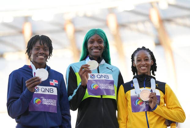 (220723) -- EUGENE, July 23, 2022 -- Gold medalist Shaunae Miller-Uibo (C) of Bahamas, silver medalist Marileidy Paulino (L) of the Dominican Republic and bronze medalist Sada Williams of Barbados pose for photos during the women s 400m awarding ceremony at the World Athletics Championships Oregon22 in Eugene, Oregon, the United States, July 22, 2022. ) (SP)U.S.-EUGENE-ATHLETICS-WORLD CHAMPIONSHIPS-WOMEN S 400M-AWARDING CEREMONY WangxYing 