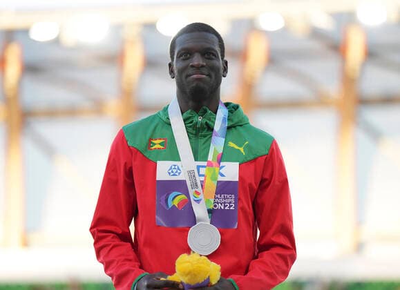 (220723) -- EUGENE, July 23, 2022 -- Silver medalist Kirani James of Grenada poses for photos during the men s 400m awarding ceremony at the World Athletics Championships Oregon22 in Eugene, Oregon, the United States, July 22, 2022. ) (SP)U.S.-EUGENE-ATHLETICS-WORLD CHAMPIONSHIPS-MEN S 400M-AWARDING CEREMONY WangxYing 