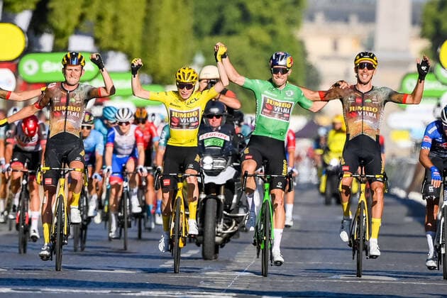 Belgian Tiesj Benoot of Jumbo-Visma, Danish Jonas Vingegaard of Jumbo-Visma, Belgian Wout Van Aert of Team Jumbo-Visma and French Christophe Laporte of Jumbo-Visma celebrate after winning stage 21, the final stage of the Tour de France cycling race, from Paris la Defense Arena to Paris Champs-Elysees, France, on Sunday 24 July 2022. This year s Tour de France takes place from 01 to 24 July 2022. - UK OUT DAVIDxSTOCKMAN  x37788713x
