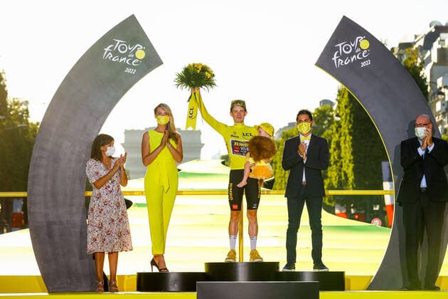 Danish Jonas Vingegaard of Jumbo-Visma celebrates on the podium in the yellow jersey of leader in the overall ranking after stage 21, the final stage of the Tour de France cycling race, from Paris la Defense Arena to Paris Champs-Elysees, France, on Sunday 24 July 2022. This year s Tour de France takes place from 01 to 24 July 2022. - UK OUT DAVIDxPINTENS  x37789622x
