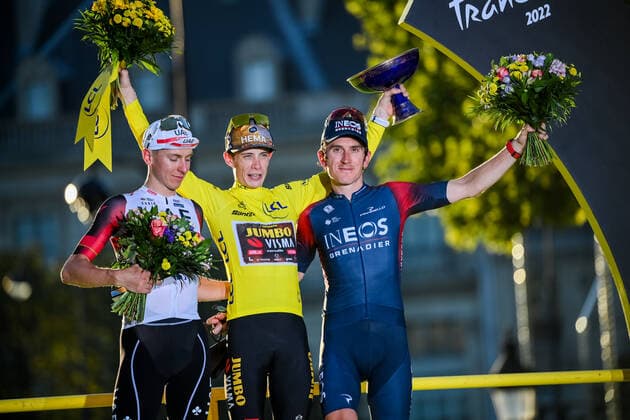 Slovenian Tadej Pogacar of UAE Team Emirates, Danish Jonas Vingegaard of Jumbo-Visma and British Geraint Thomas of Ineos Grenadiers celebrate on the podium of stage 21, the final stage of the Tour de France cycling race, from Paris la Defense Arena to Paris Champs-Elysees, France, on Sunday 24 July 2022. This year s Tour de France takes place from 01 to 24 July 2022. - UK OUT DAVIDxSTOCKMAN  x37789768x