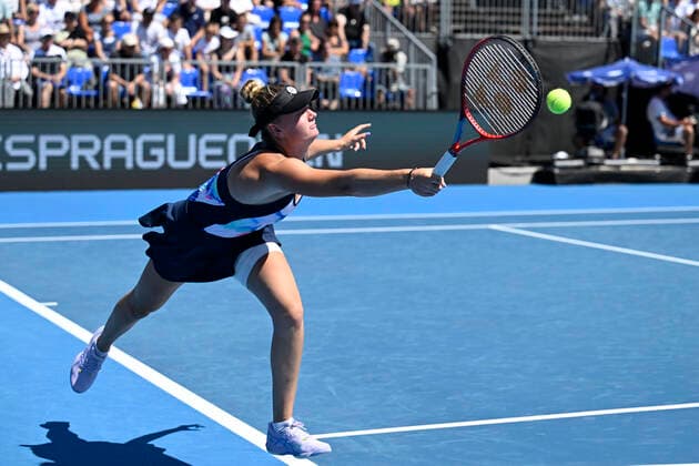 Lucie Havlickova of Cech Republic returns the ball to Anett Kontaveit of Estonia during the Livesport Prague Open WTA, Tennis Damen women’s tennis tournament match in Prague, Czech Republic, July 28, 2022. (CTKxPhoto MichalxKamaryt) CTKPhotoP2022072804497  kmt