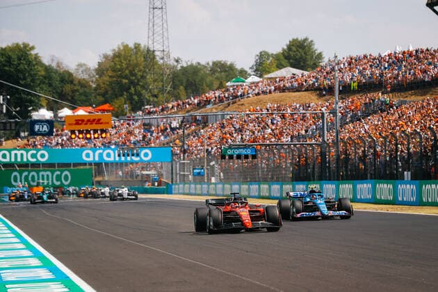 16 LECLERC Charles (mco), Scuderia Ferrari F1-75, 31 OCON Esteban (fra), Alpine F1 Team A522, action during the Formula 1 Aramco Magyar Nagydij 2022, Hungarian Grand Prix 2022, 12th round of the 2022 FIA Formula One World Championship, WM, Weltmeisterschaft from July 28 to 31, 2022 on the Hungaroring, in Mogyorod, Hungary - F1 - HUNGARIAN GRAND PRIX 2022 DPPI Panoramic  00122030__V2_3052