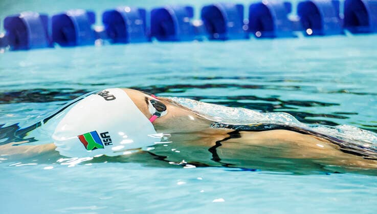 Sport Bilder des Tages 29th July 2022; Sandwell Aquatic Centre, Birmingham, Midlands, England: Day 2 of the 2022 Commonwealth Games: Rebecca Media (RSA) during Heat 3 of the Women& x2019;s 100m Backstroke  ActionPlus12411932 RolandxHarrison