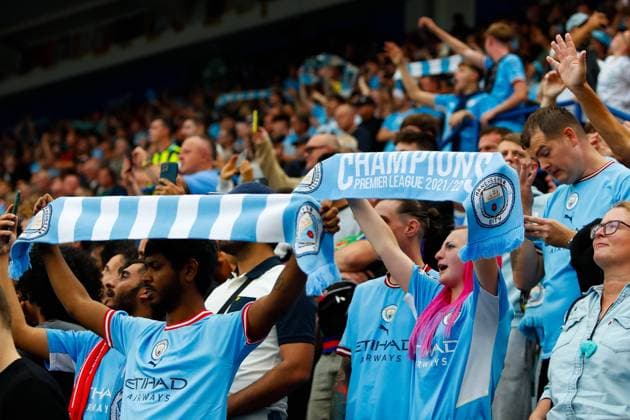 30th July 2022; The King Power Stadium, Leicester, Leicestershire, England; FA Community Shield, Liverpool versus Manchester City; Manchester City fans hold scarves during a rendition of Blue Moon  ActionPlus12412161 GrahamxWilson