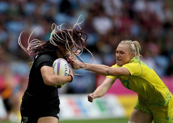 COM22 RUGBY SEVENS, Maddison Levi of Australia tackles Portia Woodman of New Zealand during the Women?s Rugby Sevens Semi Final match between Australia and New Zealand on Day 2 of the XXII Commonwealth Games at Coventry Stadium in Birmingham, England, Saturday, July 30, 2022. ( NO ARCHIVING, EDITORIAL USE ONLY, NO USE IN BOOKS WITHOUT CONSENT BIRMINGHAM UNITED KINGDOM  Copyright: xMATTHEWxIMPEYx 20220731001685211718
