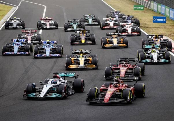 BUDAPEST George Russell 63 with the Mercedes W13, Carlos Sainz 55 with the Ferrari, Max Verstappen 1 with the Oracle Red Bull Racing RB18 Honda and other drivers during the start of the Hungarian Grand Prix at the Hungaroring Circuit on July 31, 2022 in Budapest, Hungary REMKO DE WAAL Match 2022 xVIxANPxSportx xxANPxIVx 452520896 originalFilename: 452520896.jpg
