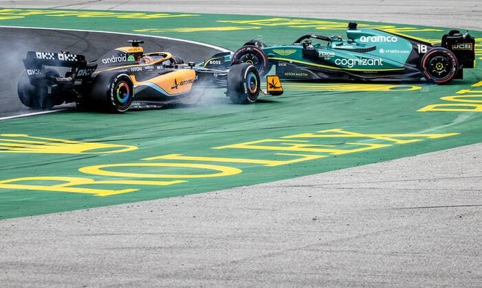 BUDAPEST Daniel Ricciardo 3 driving the McLaren MCL36 and Lance Stroll 18 driving the Aston Martin AMR22 during the Hungarian Grand Prix at the Hungaroring Circuit on July 31, 2022 in Budapest, Hungary REMKO DE WAAL Match 2022 xVIxANPxSportx xxANPxIVx 452522459 originalFilename: 452522459.jpg