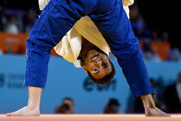 Sport Bilder des Tages COM22 JUDO, Faye Njie of The Gambia during the Men?s 73kg Judo Final against Daniel Powell of England on Day 5 of the XXII Commonwealth Games at Coventry Arena in Birmingham, England, Tuesday, August 2, 2022. ( NO ARCHIVING, EDITORIAL USE ONLY, NO USE IN BOOKS WITHOUT CONSENT BIRMINGHAM UNITED KINGDOM  Copyright: xJAMESxROSSx 20220803001686010919