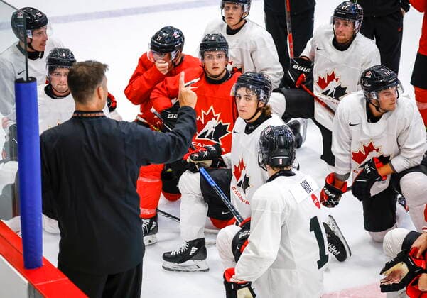 August 2, 2022, Calgary, AB, CANADA: CanadaöÄÃ s National Junior Team assistant coach Michael Dyck, left, gives instructions during a training camp practice in Calgary, Tuesday, Aug. 2, 2022. Michael Dyck  - ZUMAc35_ 20220802_zaf_c35_023 Copyright: xJeffxMcintoshx