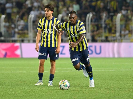 Ferdi Kadioglu (L) and Lincoln Henrique Oliveira dos Santos of Fenerbahce SK during the UEFA Europa League Third Qualifying Round first Leg match between Fenerbahce SK and FC Slovacko at Ulker Stadium in Istanbul Turkey on August 04 , 2022. ( Photo by Seskimphoto ) 