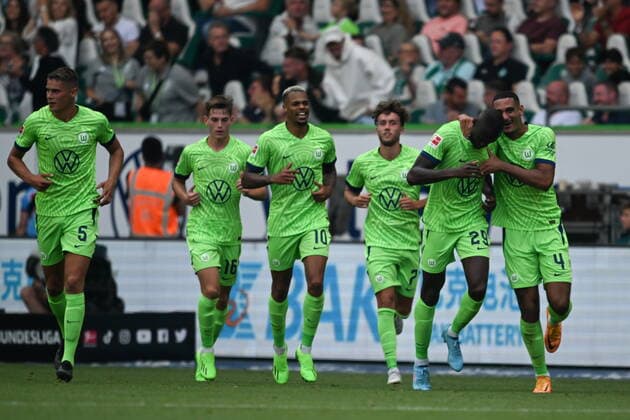 GER, VfL Wolfsburg vs SV Werder Bremen 06 08 2022, Volkswagen Arena , Wolfsburg , GER, VfL Wolfsburg vs SV Werder Bremen in picture picture shows Joshua Guilavogui VfL Wolfsburg 29 scores 2 2 After Max Kruse VfL Wolfsburg 9 cheers nordphotoxGmbHx xKröger nordphoto00008