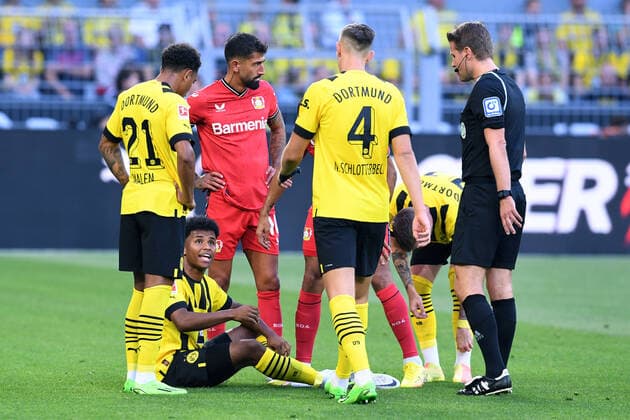 Soccer 1 Bundesliga 1 Matchday Borussia Dortmund Bayer 04 Leverkusen on 06 08 2022 at Signal Iduna Park in Dortmund Karim Adeyemi Dortmund injured on the ground DFL regulations prohibit any use of photographs as image sequences and or quasi video xRx
