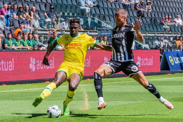 Evann Guessand (FC NANTES) Miha Blazic (ANGERS SCO) FOOTBALL : Angers SCO vs FC Nantes - Ligue 1 - JournÃ e 1- 07 08 2022 BaptisteAutissier Panoramic 