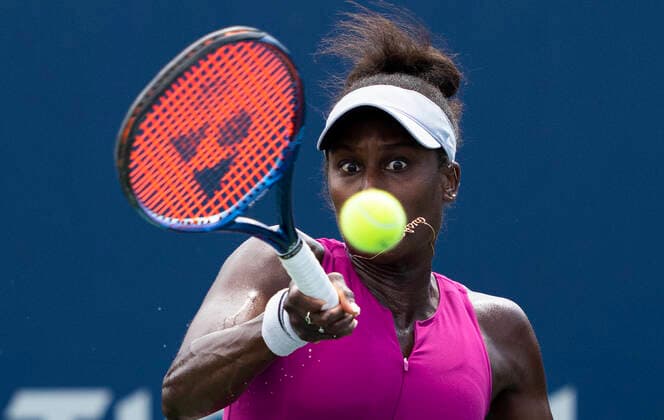 (220808) -- TORONTO, Aug. 8, 2022 -- Asia Muhammad of the United States returns the ball against Donna Vekic of Croatia during the second round of women s singles qualifying match at the 2022 National Bank Open in Toronto, Canada, on Aug. 7, 2022. (Photo by Xinhua) (SP)CANADA-TORONTO-TENNIS-NATIONAL BANK OPEN-WOMEN S SINGLES-QUALIFYING ZouxZheng 
