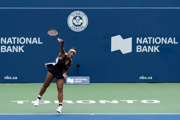 TORONTO, ON - AUGUST 08: Serena Williams serves the ball during her National Bank Open tennis tournament first round match on August 8, 2022, at Sobeys Stadium in Toronto, ON, Canada. (Photo by Julian Avram Icon Sportswire via Getty Images) TENNIS: AUG 08 National Bank Open Icon2208080895