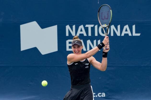TORONTO, ON - AUGUST 08: Beatriz Haddad Maia returns the ball during her National Bank Open tennis tournament first round match on August 8, 2022, at Sobeys Stadium in Toronto, ON, Canada. (Photo by Julian Avram Icon Sportswire via Getty Images) TENNIS: AUG 08 National Bank Open Icon2208080389