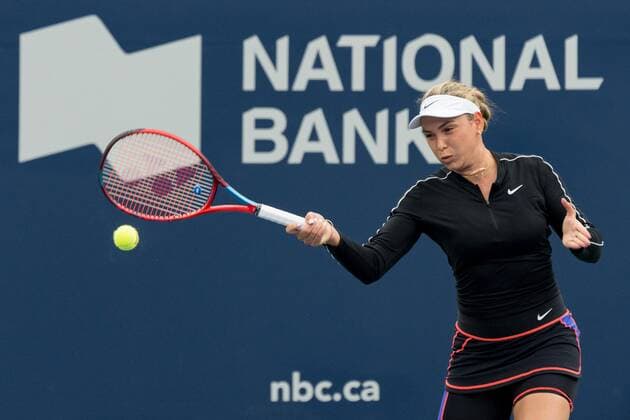 TORONTO, ON - AUGUST 08: Donna Vekic returns the ball during her National Bank Open tennis tournament first round match on August 8, 2022, at Sobeys Stadium in Toronto, ON, Canada. (Photo by Julian Avram Icon Sportswire via Getty Images) TENNIS: AUG 08 National Bank Open Icon2208080050