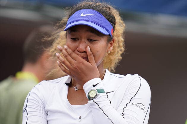 August 9, 2022, Toronto, Ontario, Canada: NAOMI OSAKA reacts during her match against Kaia Kanepi at the National Bank Open. Osaka retired from her first-round match because of a back injury. Toronto Canada - ZUMAm215 20220809_zip_m215_024 Copyright: xArlynxMcAdoreyx