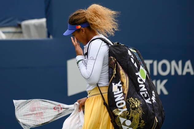 August 9, 2022, Toronto, ON, Canada: Naomi Osaka wipes a tear after retiring early from a match against Kaia Kanepi of Estonia, during the National Bank Open tennis tournament in Toronto, on Tuesday, Aug. 9, 2022. Canada News - August 9, 2022  - ZUMAc35_ 20220809_zaf_c35_116 Copyright: xChristopherxKatsarovx