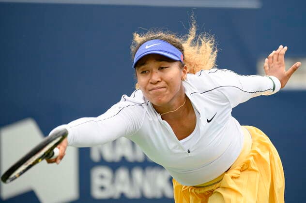 August 9, 2022, Toronto, ON, Canada: Naomi Osaka, of Japan, misses returning the ball during a match against Kaia Kanepi, of Estonia, during the National Bank Open tennis tournament in Toronto on Tuesday, Aug. 9, 2022. Canada News - August 9, 2022 - ZUMAc35_ 20220809_zaf_c35_130 Copyright: xChristopherxKatsarovx