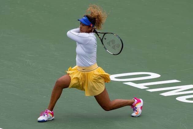 TORONTO, ON - AUGUST 09: Naomi Osaka returns the ball during her National Bank Open tennis tournament first round match on August 9, 2022, at Sobeys Stadium in Toronto, ON, Canada. (Photo by Julian Avram Icon Sportswire) TENNIS: AUG 09 National Bank Open Icon22080928032