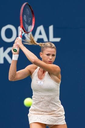 TORONTO, ON - AUGUST 09: Camila Giorgi returns the ball during her National Bank Open tennis tournament first round match on August 9, 2022, at Sobeys Stadium in Toronto, ON, Canada. (Photo by Julian Avram Icon Sportswire) TENNIS: AUG 09 National Bank Open Icon22080914492
