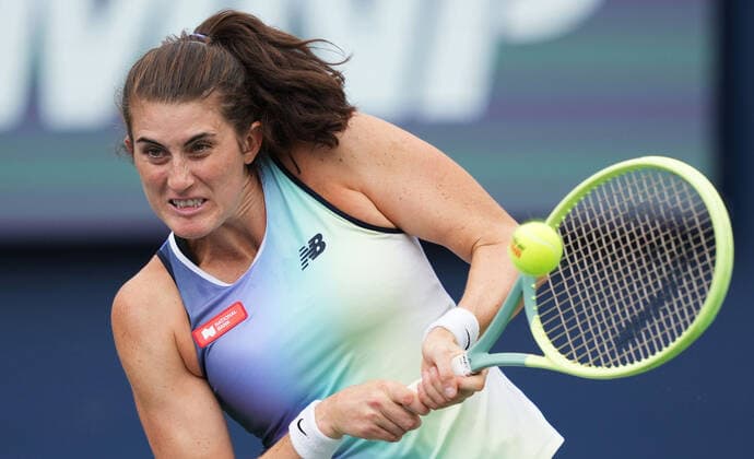 (220810) -- TORONTO, Aug. 10, 2022 -- Rebecca Marino of Canada returns the ball during the first round of women s singles match between Rebecca Marino of Canada and Zheng Qinwen of China at the 2022 National Bank Open tennis tournament in Toronto, Canada, on Aug. 9, 2022. (Photo by Zou Zheng Xinhua) (SP)CANADA-TORONTO-TENNIS-NATIONAL BANK OPEN-WOMEN S SINGLES linwei2 