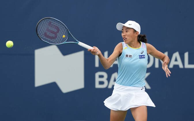 (220810) -- TORONTO, Aug. 10, 2022 -- Zhang Shuai of China returns the ball during the first round of women s singles match between Zhang Shuai of China and Cristina Bucsa of Spain at the 2022 National Bank Open tennis tournament in Toronto, Canada, on Aug. 9, 2022. (Photo by Zou Zheng Xinhua) (SP)CANADA-TORONTO-TENNIS-NATIONAL BANK OPEN-WOMEN S SINGLES linwei2 