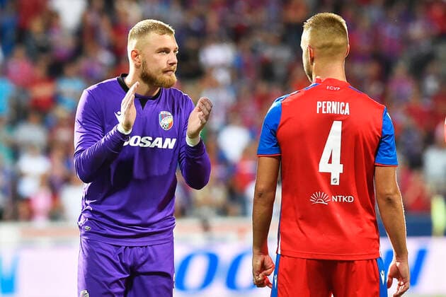 Goalkeeper Jindrich Stanek, left, and Ludek Pernica of Viktoria celebrate victory in the Football Champions League 3rd qualifying round return match FC Viktoria Plzen vs FC Sheriff Tiraspol in Plzen, August 9, 2022. (CTKxPhoto MiroslavxChaloupka) CTKPhotoP2022080907343  cha021k
