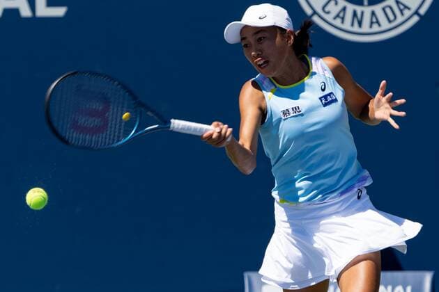 TORONTO, ON - AUGUST 10: Shuai Zhang returns the ball during her National Bank Open tennis tournament second round match on August 10, 2022, at Sobeys Stadium in Toronto, ON, Canada. (Photo by Julian Avram Icon Sportswire) TENNIS: AUG 10 National Bank Open Icon2208102690