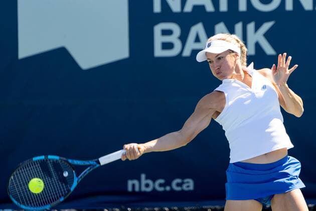 TORONTO, ON - AUGUST 10: Yulia Putintseva returns the ball during her National Bank Open tennis tournament second round match on August 10, 2022, at Sobeys Stadium in Toronto, ON, Canada. (Photo by Julian Avram Icon Sportswire) TENNIS: AUG 10 National Bank Open Icon2208102751