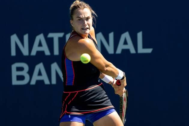 TORONTO, ON - AUGUST 10: Aryna Sabalenka returns the ball during her National Bank Open tennis tournament second round match on August 10, 2022, at Sobeys Stadium in Toronto, ON, Canada. (Photo by Julian Avram Icon Sportswire) TENNIS: AUG 10 National Bank Open Icon2208103298