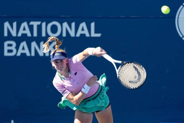 TORONTO, ON - AUGUST 10: Jil Teichmann serves the ball during her National Bank Open tennis tournament second round match on August 10, 2022, at Sobeys Stadium in Toronto, ON, Canada. (Photo by Julian Avram Icon Sportswire) TENNIS: AUG 10 National Bank Open Icon2208103471