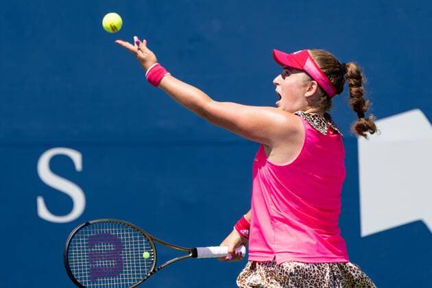 TORONTO, ON - AUGUST 10: Jelena Ostapenko serves the ball during her National Bank Open tennis tournament second round match on August 10, 2022, at Sobeys Stadium in Toronto, ON, Canada. (Photo by Julian Avram Icon Sportswire) TENNIS: AUG 10 National Bank Open Icon2208100771