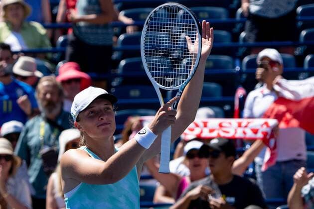 TORONTO, ON - AUGUST 10: Iga Swiatek celebrates after winning her National Bank Open tennis tournament second round match on August 10, 2022, at Sobeys Stadium in Toronto, ON, Canada. (Photo by Julian Avram Icon Sportswire) TENNIS: AUG 10 National Bank Open Icon2208102086