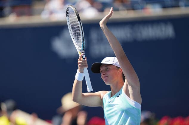 (220811) -- TORONTO, Aug. 11, 2022 -- Iga Swiatek of Poland celebrates victory after the second round of women s singles match between Ajla Tomljanovic of Australia and Iga Swiatek of Poland at the 2022 National Bank Open tennis tournament in Toronto, Canada, on Aug. 10, 2022. (Photo by Xinhua) (SP)CANADA-TORONTO-TENNIS-NATIONAL BANK OPEN-WOMEN S SINGLES ZouxZheng 