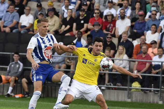 Bojan Radulovic of HJK (left) and Sven Karic of Maribor during the UEFA European League 3rd Qualification Round football match HJK vs Maribor in Helsinki on August 11, 2022. Helsinki Finland LKFTJK20220811190326RXRK  Copyright: xJussixNukarix LKFTJK20220811190326RXRK